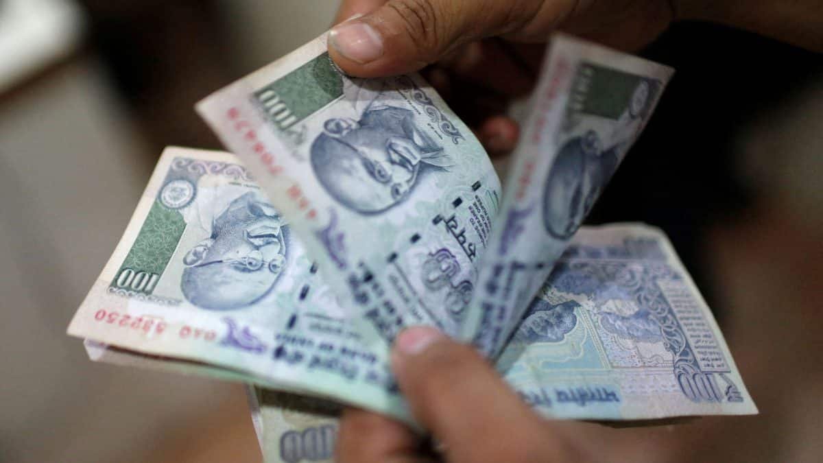 Rupee surges to two-week high as RBI intervention, falling oil prices fuel sharp rally