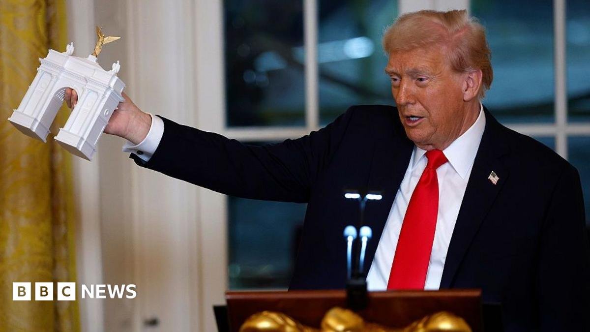 Trump says triumphal arch will be military complex with drones and snipers