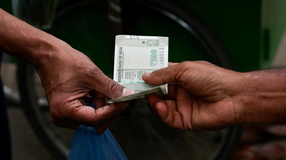 Rupee falls 13 paise to 95.56 against U.S. dollar in early trade