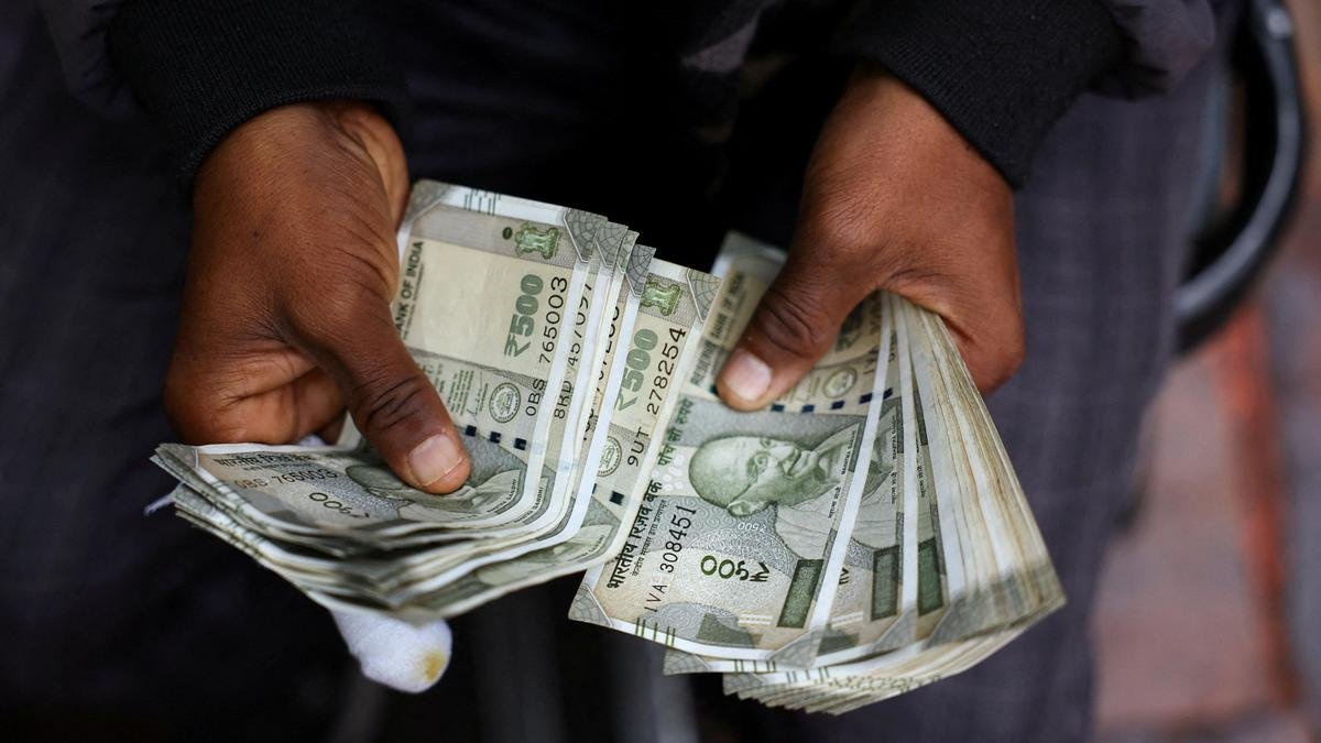 Rupee trades in narrow range against U.S. dollar in early trade
