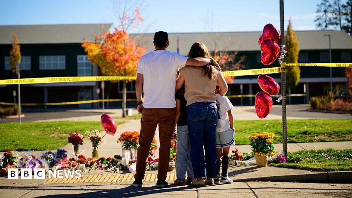 Teacher fought US school attacker before armed dad shot suspect 'multiple times'